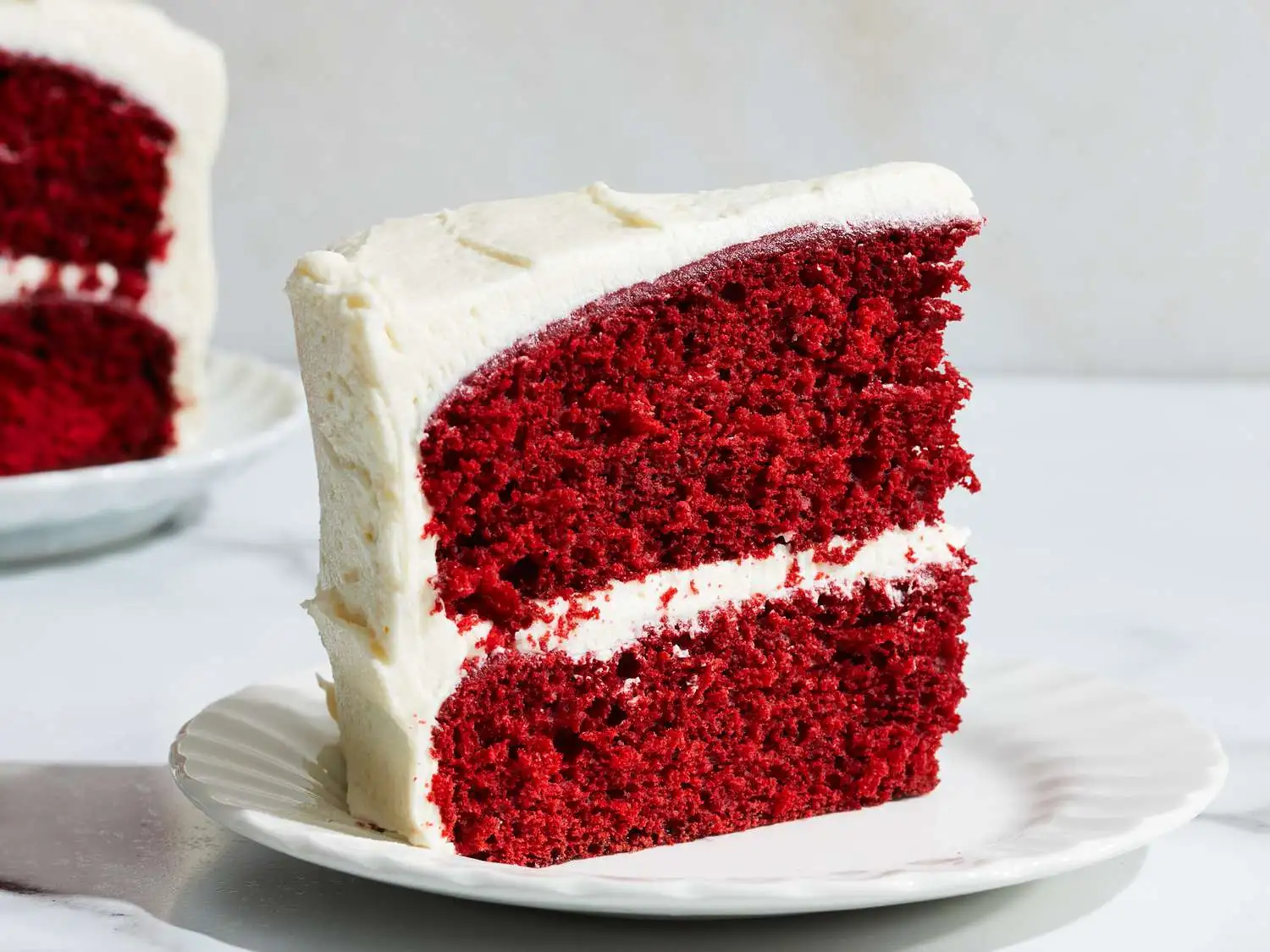 Red Velvet Cake - Classic red velvet cake with cream cheese frosting at Bombay Bakery Calgary